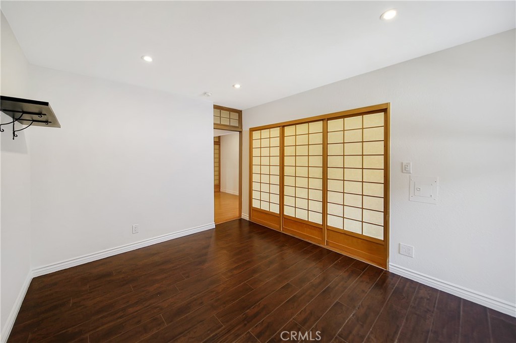 409 Burchett Street, Unit 315 Glendale, CA 91203 - Photo 11 of 34 wooden floor in an empty room with a window