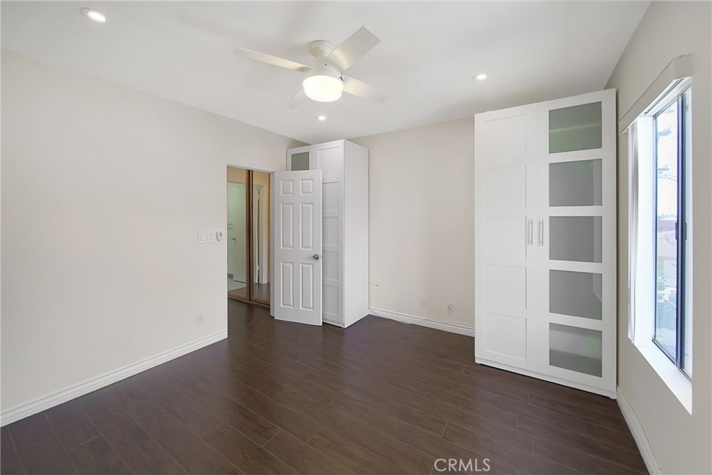 409 Burchett Street, Unit 315 Glendale, CA 91203 - Photo 16 of 34 wooden floor in an empty room with a window