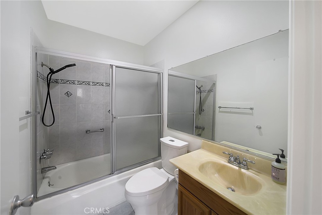 409 Burchett Street, Unit 315 Glendale, CA 91203 - Photo 20 of 34 a bathroom with a sink toilet and shower