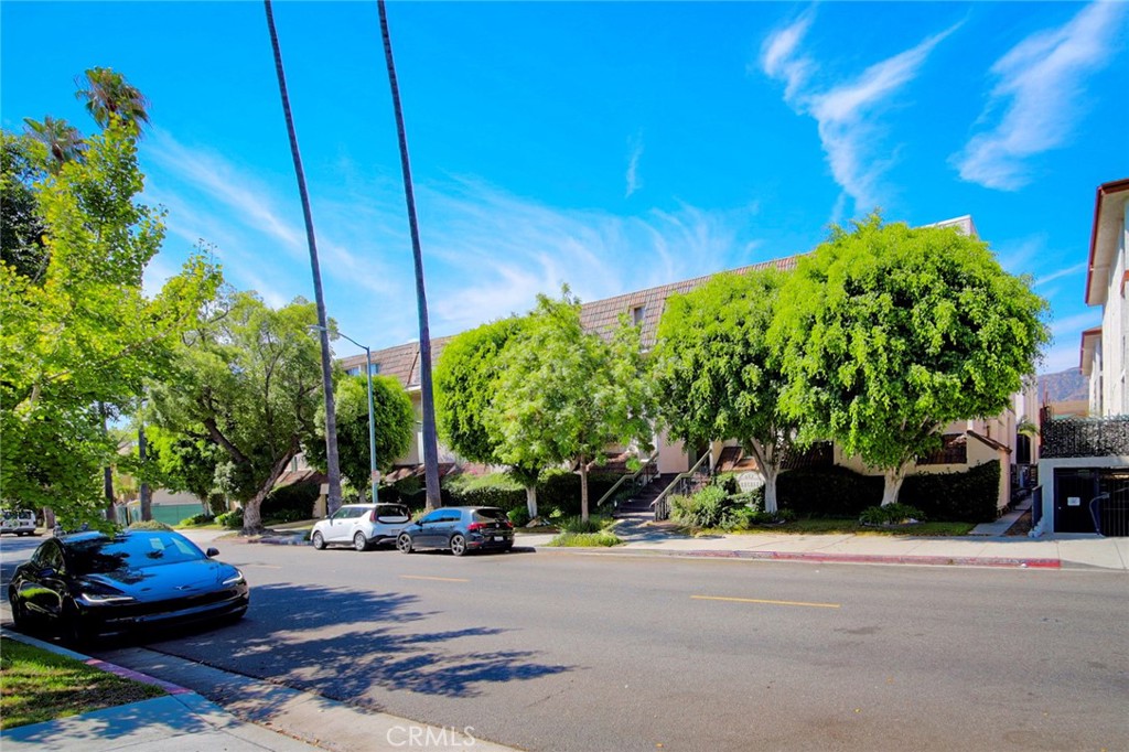 409 Burchett Street, Unit 315 Glendale, CA 91203 - Photo 30 of 34 a view of a street with cars on road