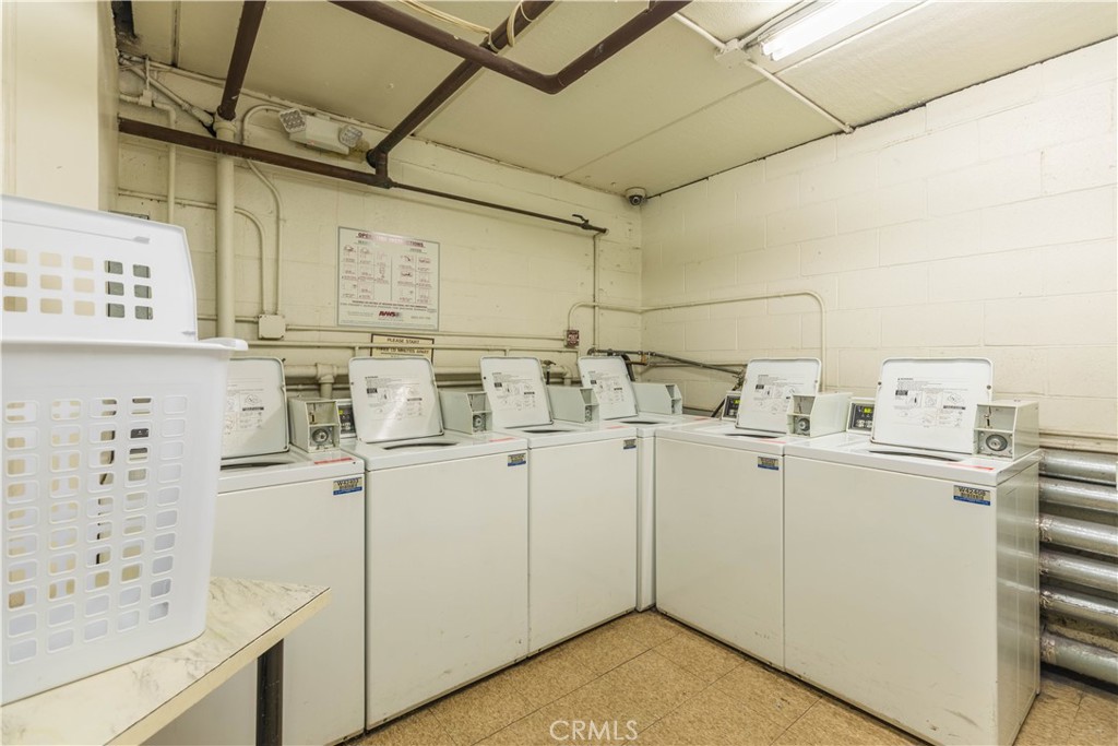 409 Burchett Street, Unit 315 Glendale, CA 91203 - Photo 31 of 34 a utility room with cabinets