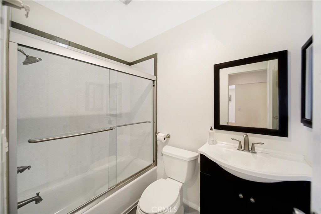 409 Burchett Street, Unit 315 Glendale, CA 91203 - Photo 8 of 34 a bathroom with a sink toilet and shower