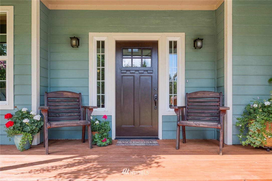314 Walker Valley Road Port Angeles, WA 98362 - Photo 2 of 25 a view of a bench in front of house