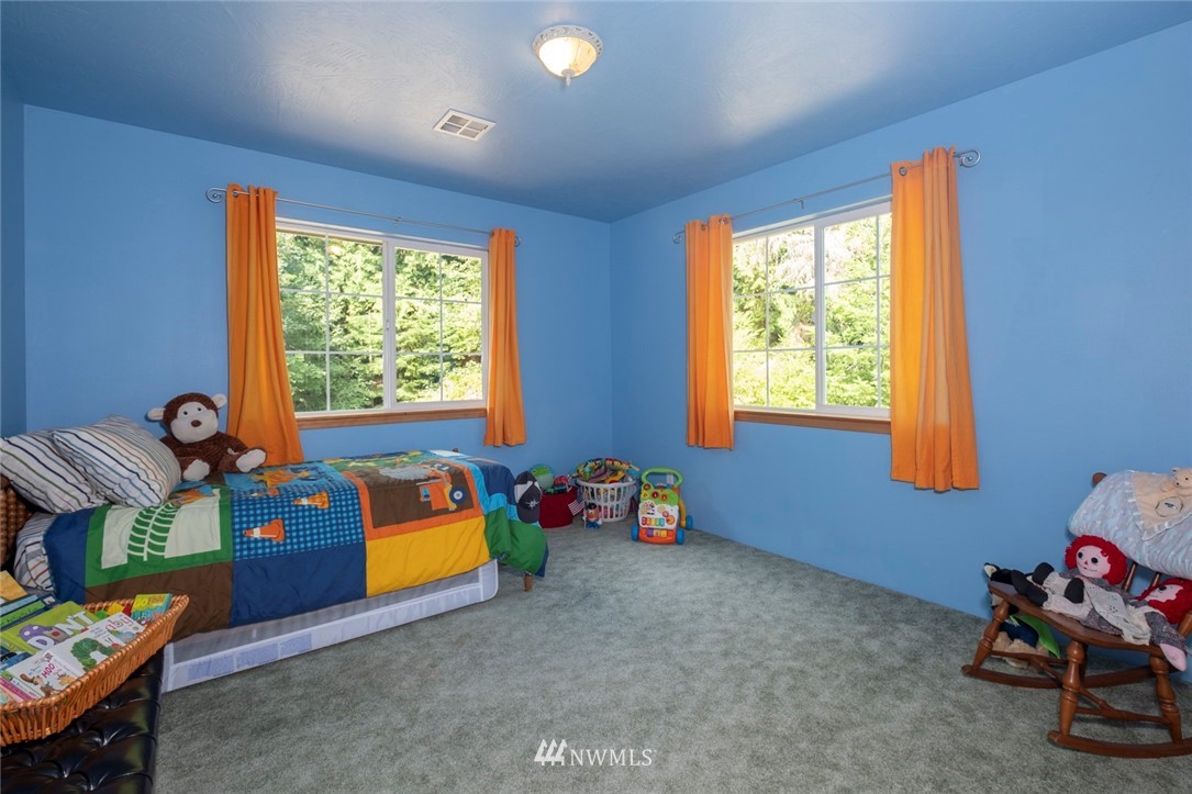 314 Walker Valley Road Port Angeles, WA 98362 - Photo 14 of 25 a room with furniture and a window