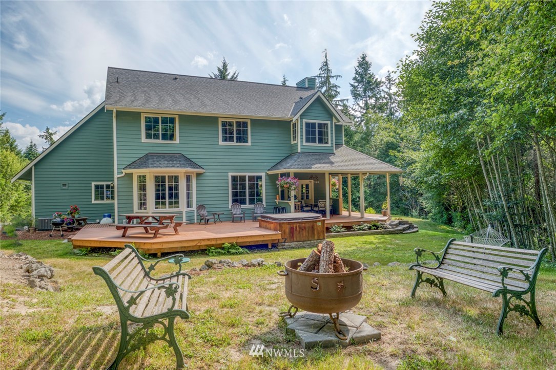 314 Walker Valley Road Port Angeles, WA 98362 - Photo 17 of 25 a view of a house with swimming pool and sitting area