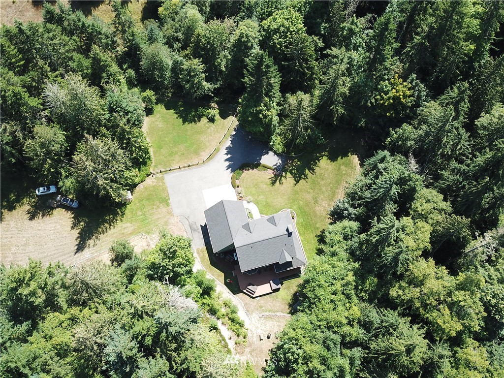314 Walker Valley Road Port Angeles, WA 98362 - Photo 22 of 25 an aerial view of a house with a yard and lake view
