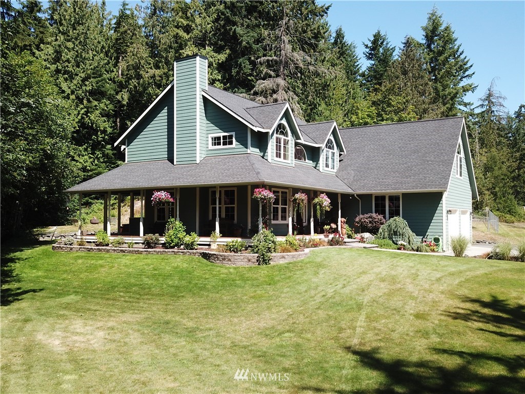 314 Walker Valley Road Port Angeles, WA 98362 - Photo 25 of 25 a front view of a house with garden