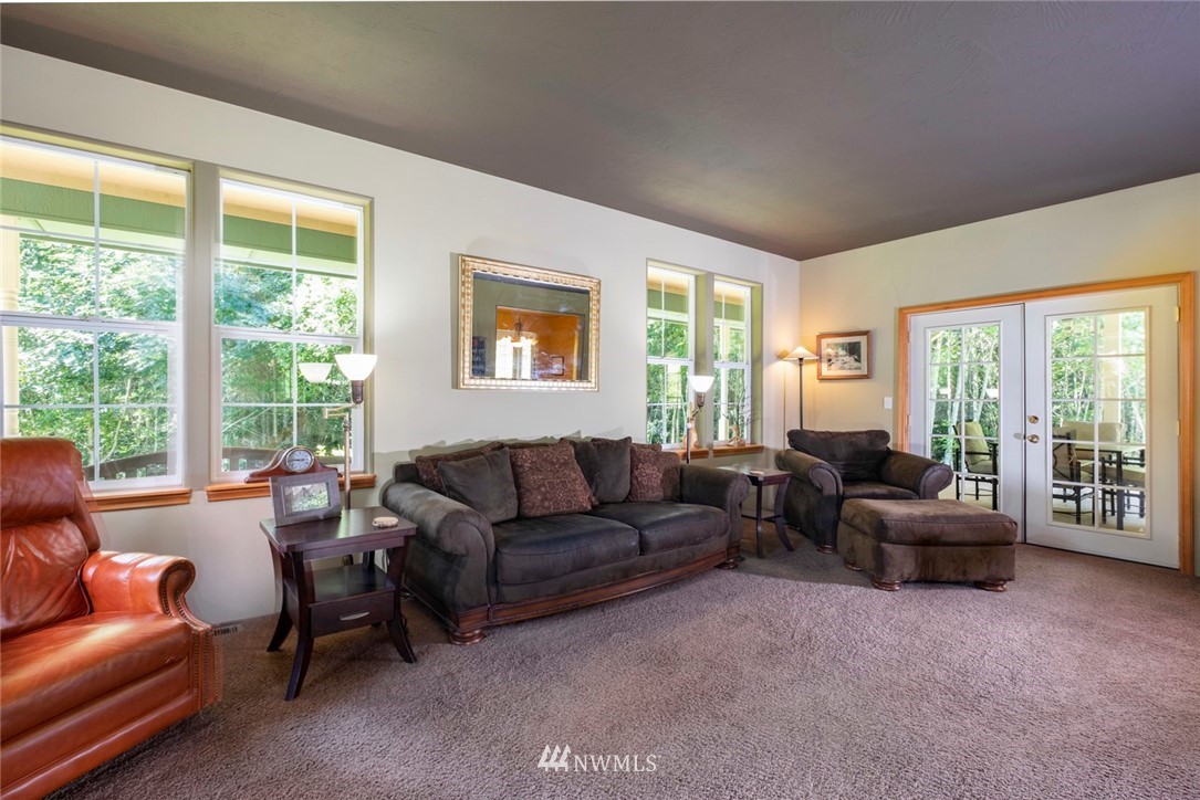 314 Walker Valley Road Port Angeles, WA 98362 - Photo 4 of 25 a living room with furniture and a large window
