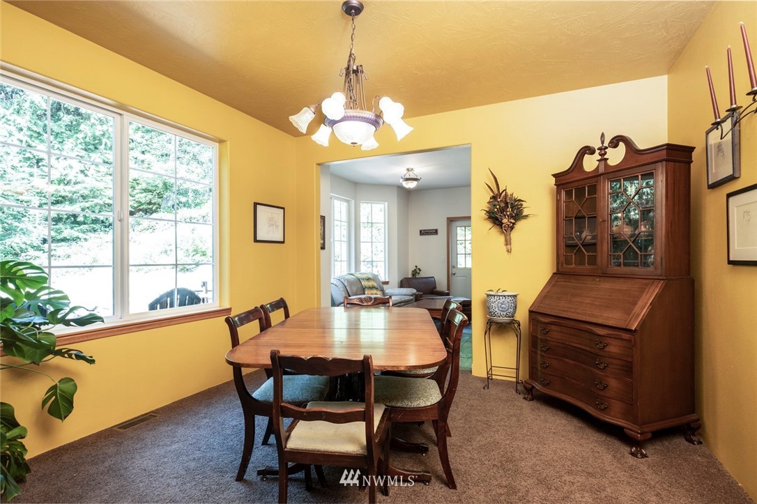 314 Walker Valley Road Port Angeles, WA 98362 - Photo 5 of 25 a dining room with furniture and window