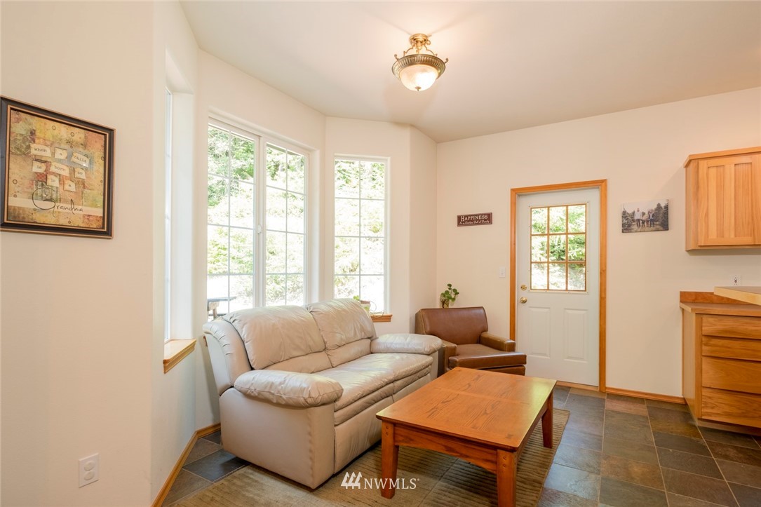 314 Walker Valley Road Port Angeles, WA 98362 - Photo 6 of 25 a living room with furniture and a window