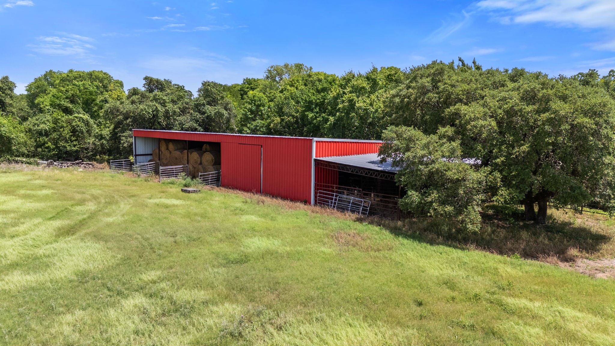 3541 Highway 159 La Grange, TX 78945 - Photo 41 of 45 Bring your horses home to this thoughtfully designed stable, offering comfort and functionality in a peaceful rural setting.
