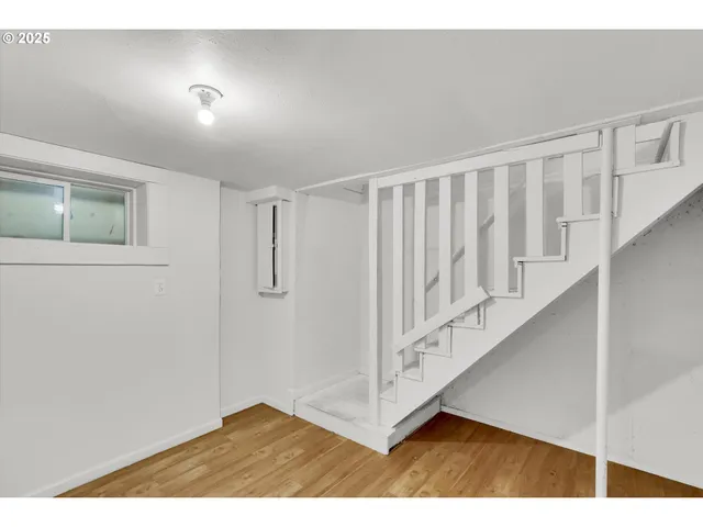 a view of entryway with wooden floor