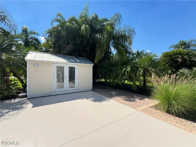 a view of garden with trees