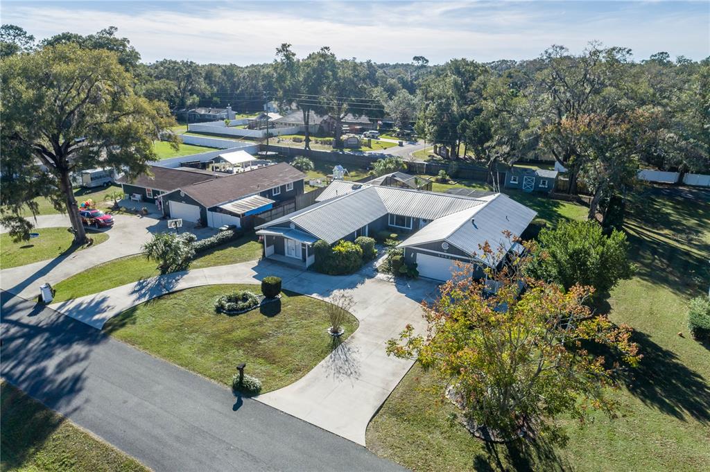 5002 Southeast 7th Place Ocala, FL 34471 - Photo 29 of 30 an aerial view of a house with garden space and street view