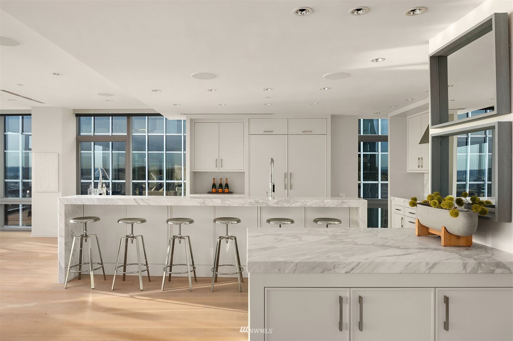 715 2nd Avenue, Unit 1702 Seattle, WA 98104 - Photo 11 of 26 a kitchen with stainless steel appliances granite countertop a stove and cabinets