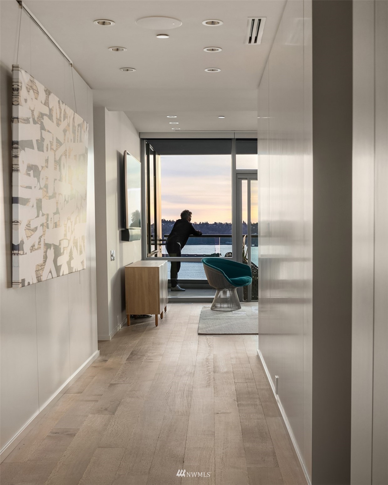 715 2nd Avenue, Unit 1702 Seattle, WA 98104 - Photo 23 of 26 a lobby with furniture and a floor to ceiling window