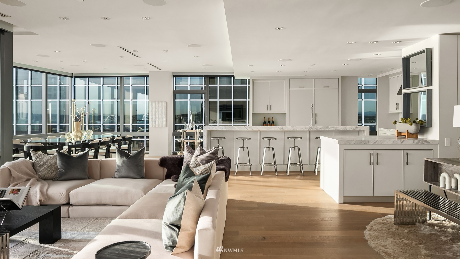 715 2nd Avenue, Unit 1702 Seattle, WA 98104 - Photo 10 of 26 a living room with furniture and a large window