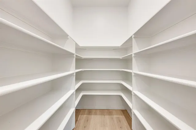 a view of a room with shelves