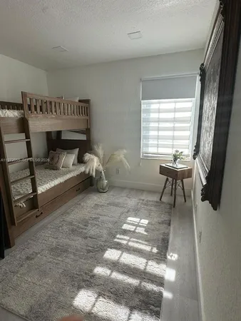 a room with furniture and a window