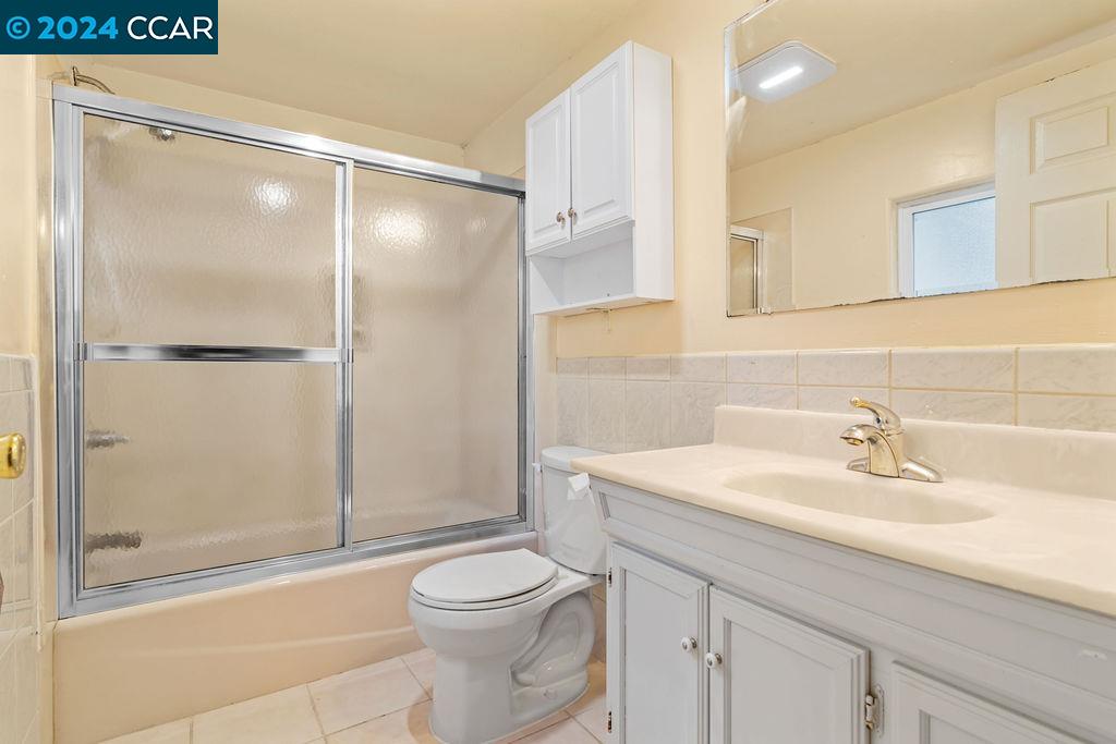 1352 Sunset Loop Lafayette, CA 94549 - Photo 14 of 29 a bathroom with a sink a toilet and shower