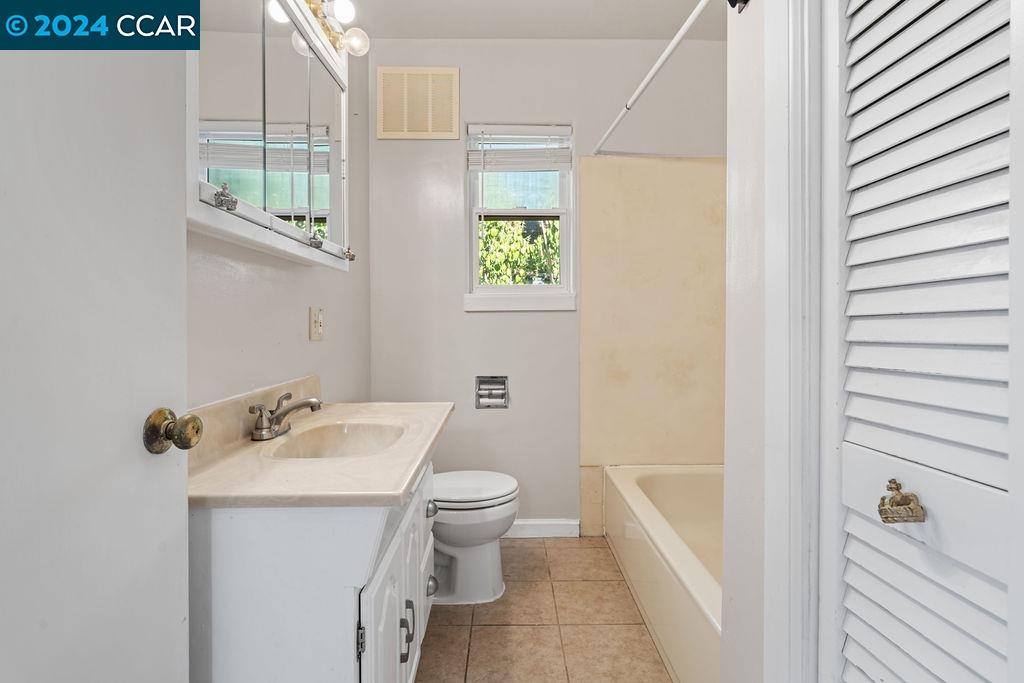 1352 Sunset Loop Lafayette, CA 94549 - Photo 16 of 29 a bathroom with a sink toilet and shower