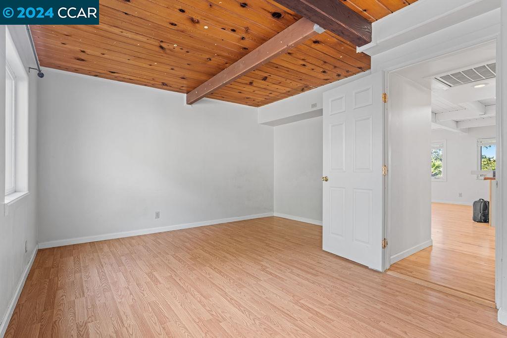 1352 Sunset Loop Lafayette, CA 94549 - Photo 17 of 29 an empty room with wooden floor