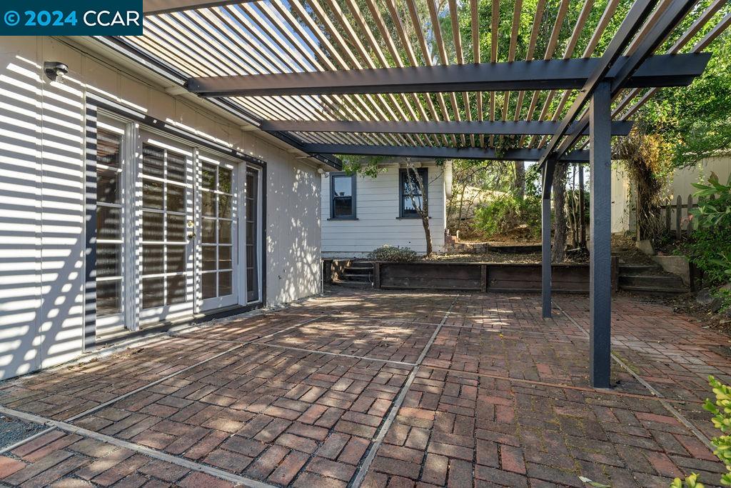 1352 Sunset Loop Lafayette, CA 94549 - Photo 23 of 29 a view of a porch with a table chairs and a patio