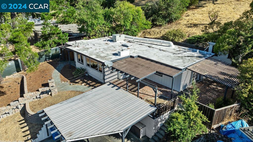 1352 Sunset Loop Lafayette, CA 94549 - Photo 25 of 29 an aerial view of a house with balcony and outdoor seating