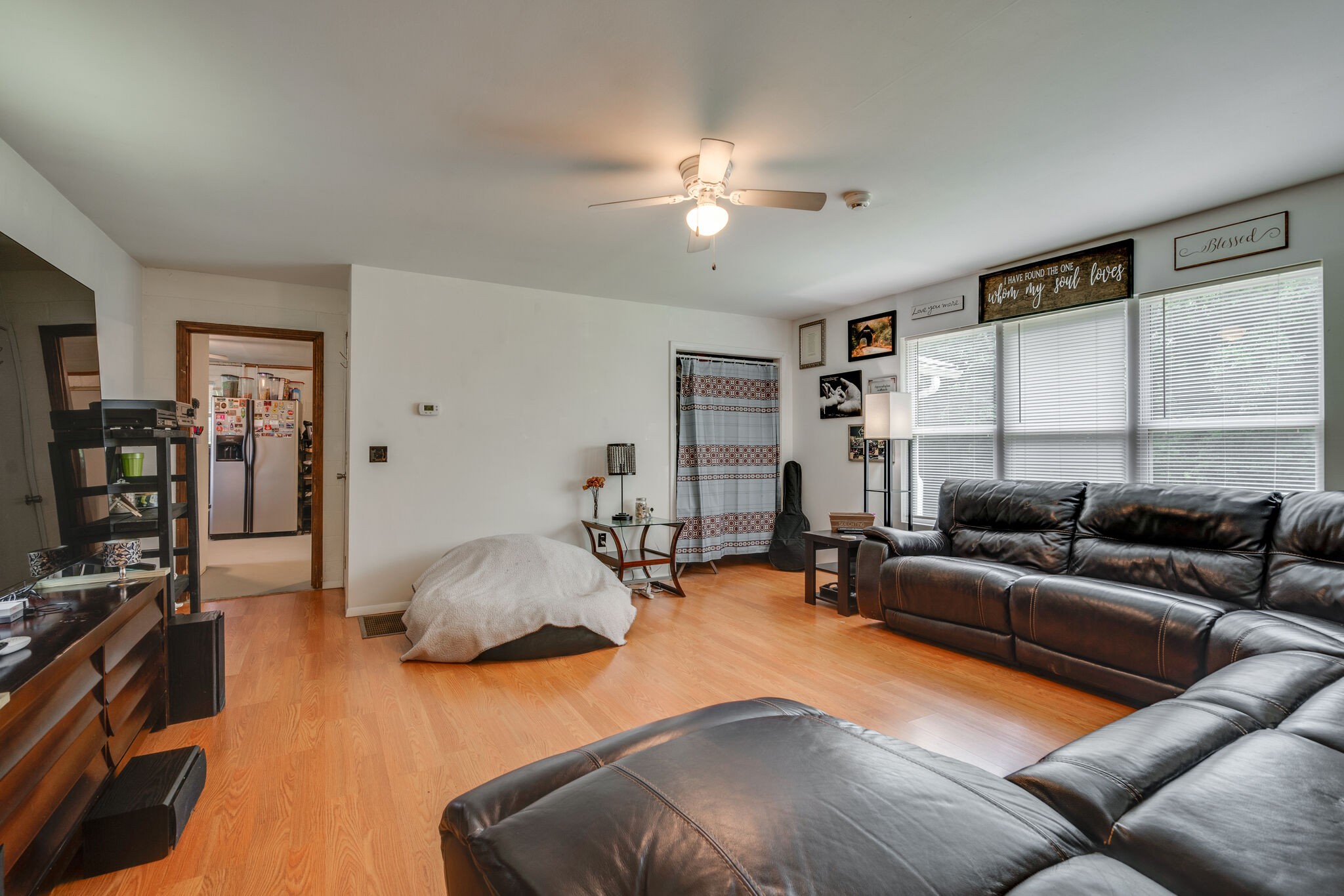 537 Chapmansboro Road Ashland City, TN 37015 - Photo 12 of 28 a living room with furniture and a flat screen tv