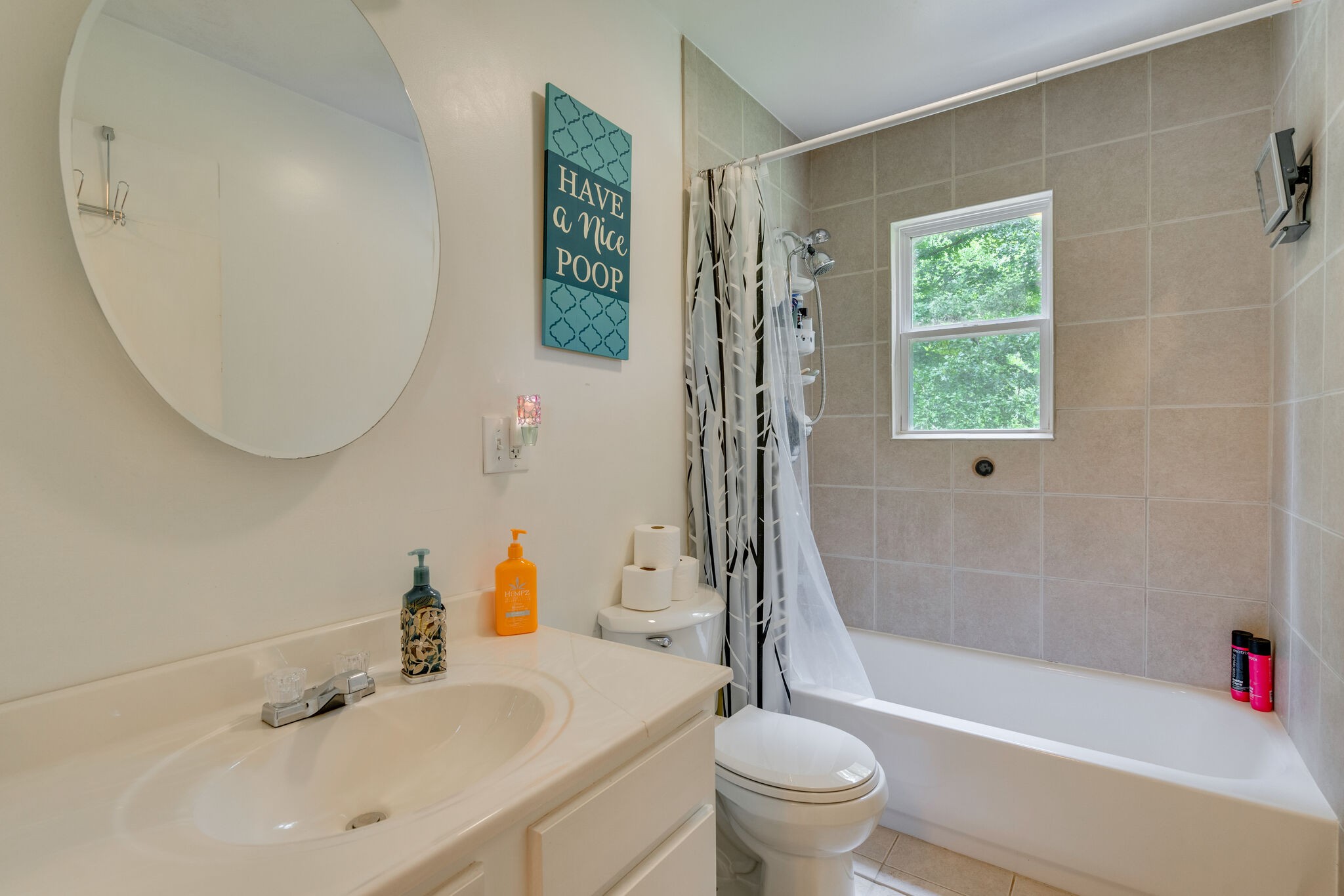 537 Chapmansboro Road Ashland City, TN 37015 - Photo 14 of 28 a bathroom with a sink toilet and shower