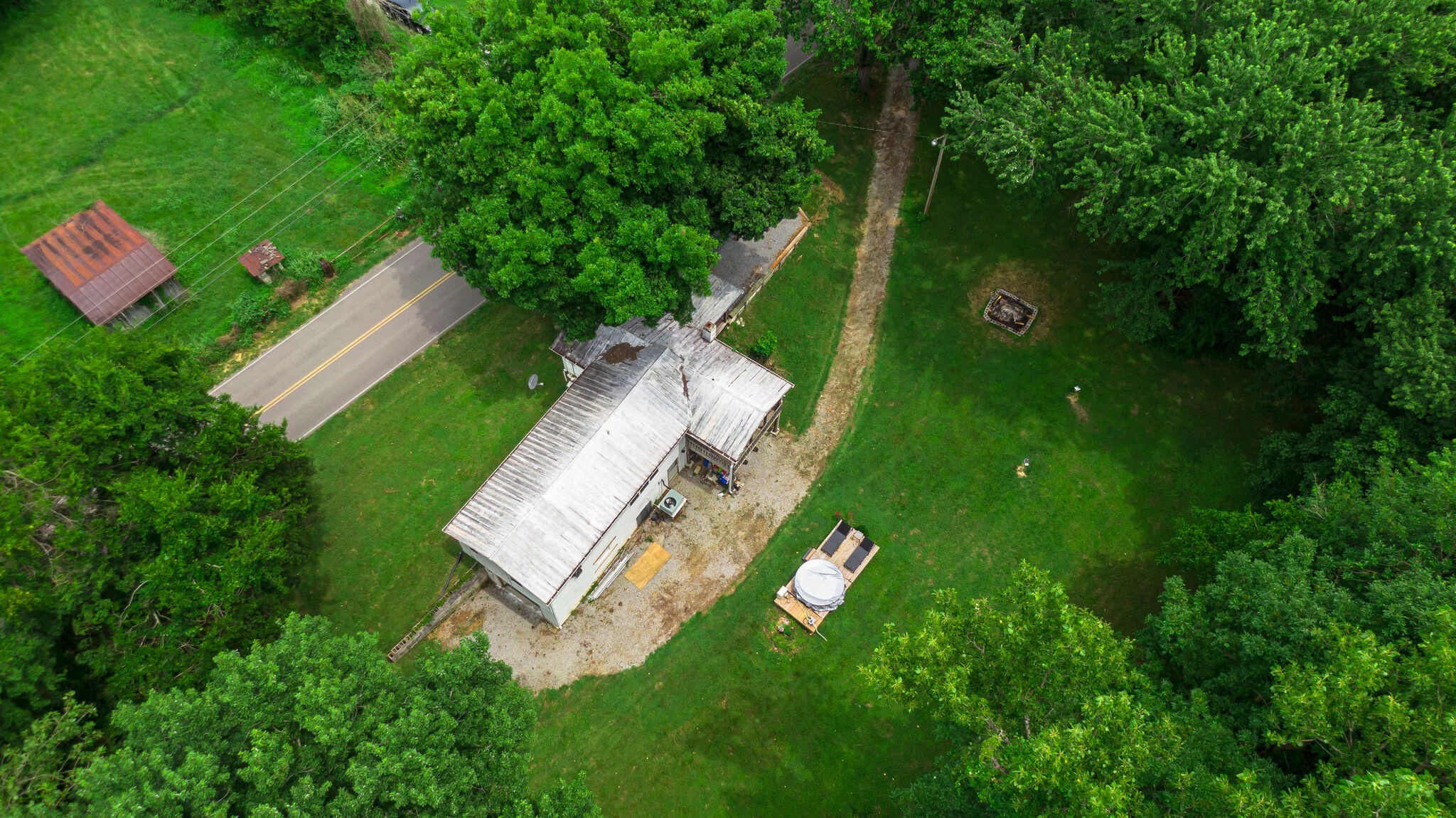 537 Chapmansboro Road Ashland City, TN 37015 - Photo 24 of 28 a view of a house with a backyard