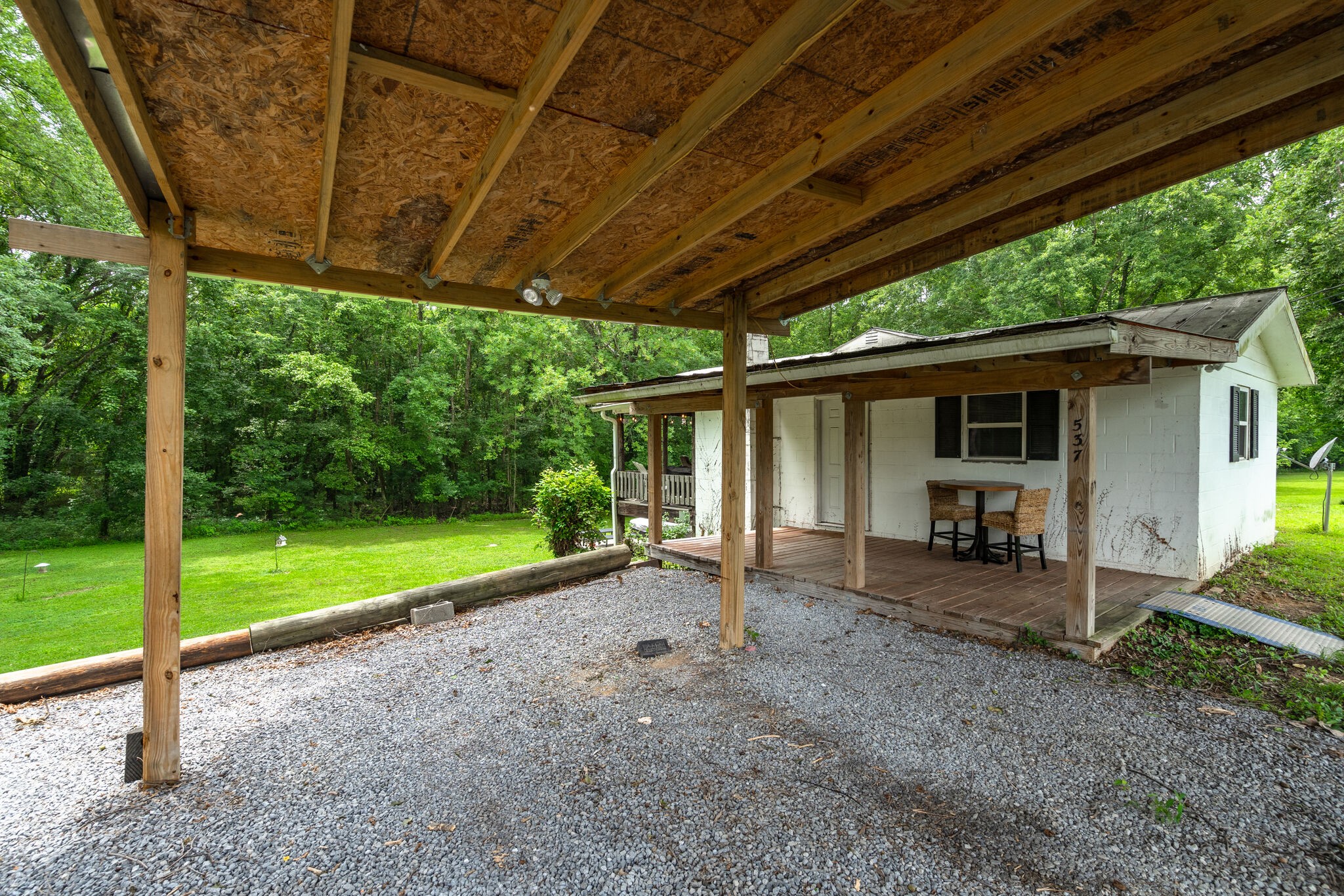537 Chapmansboro Road Ashland City, TN 37015 - Photo 4 of 28 a view of a house with backyard and porch