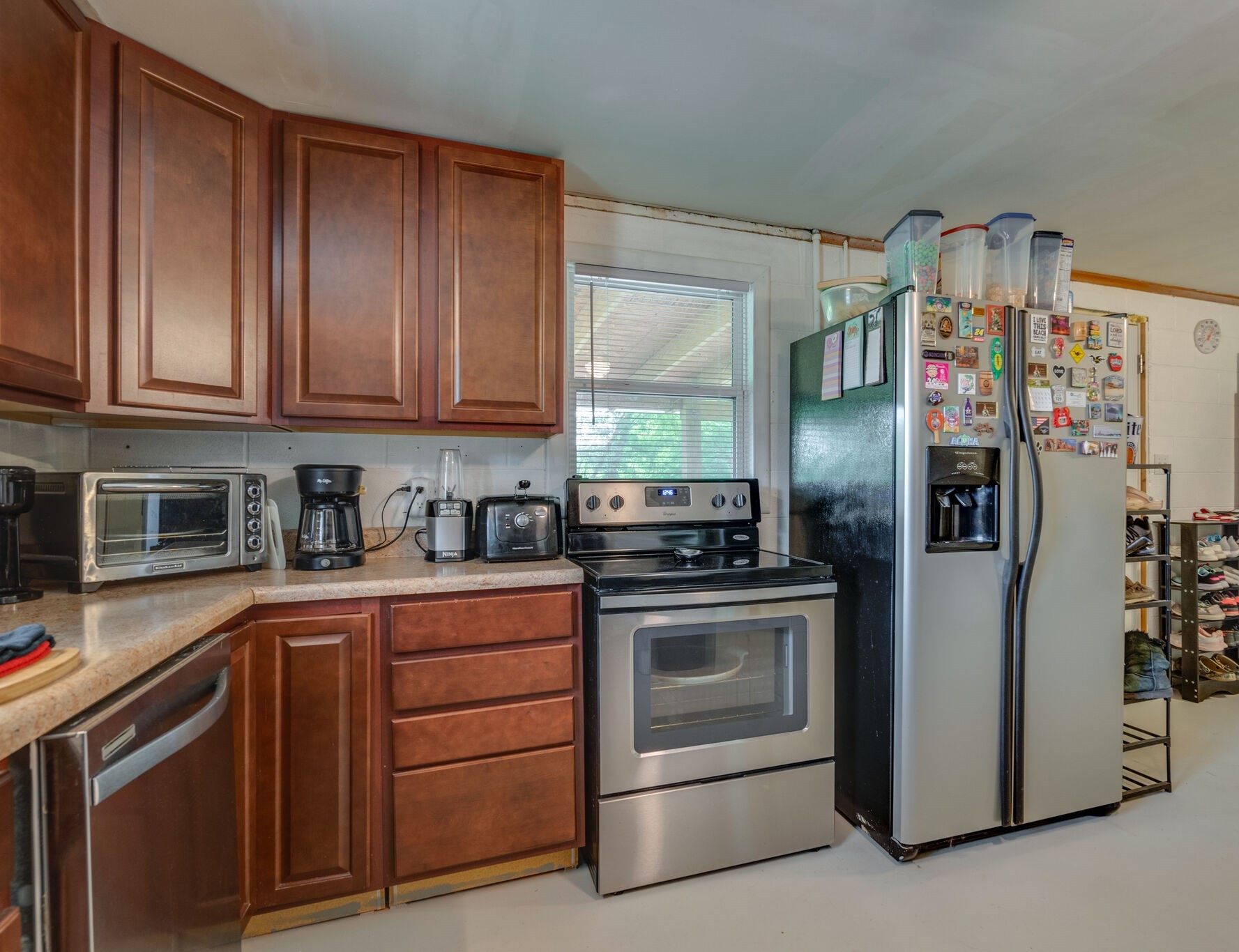 537 Chapmansboro Road Ashland City, TN 37015 - Photo 8 of 28 a kitchen with stainless steel appliances granite countertop a refrigerator stove and sink