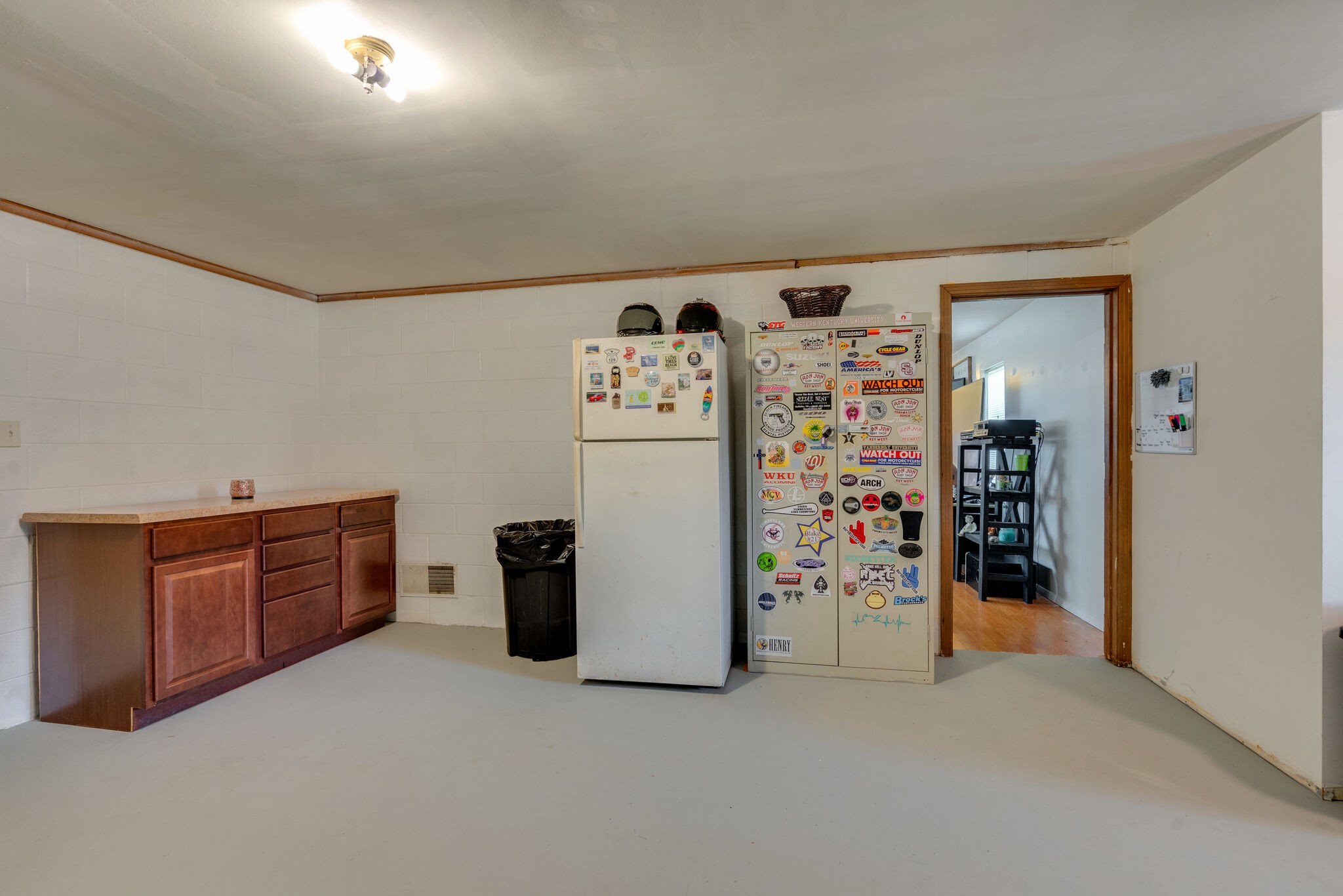 537 Chapmansboro Road Ashland City, TN 37015 - Photo 10 of 28 a view of a storage & utility room with refrigerator