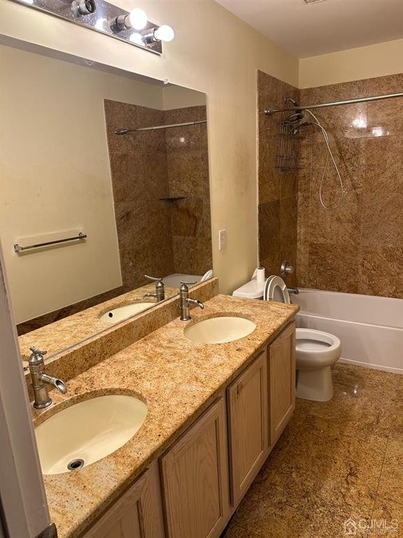 58 Timber Ridge Road North Brunswick, NJ 08902 - Photo 6 of 8 a bathroom with a granite countertop sink toilet and shower