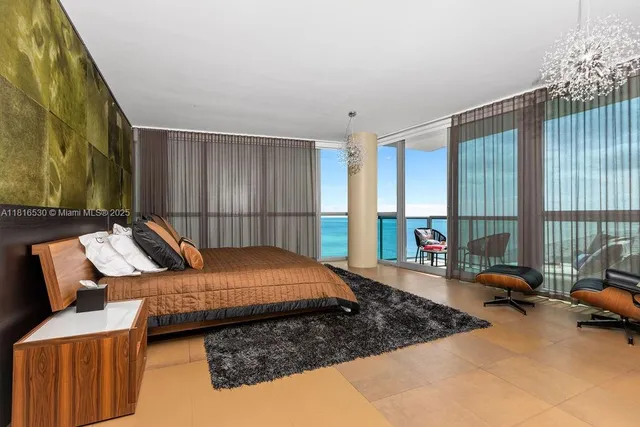 a bed room with a bed and a couch