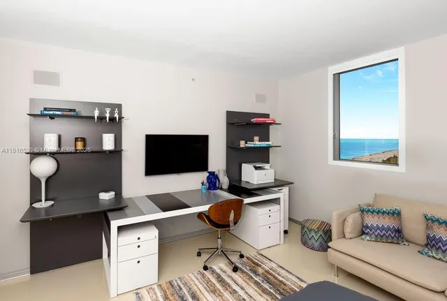 a workspace with furniture and view of workspace