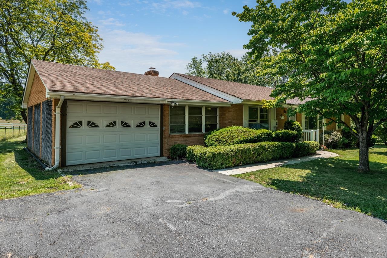 3252 Lyndhurst Road Stuarts Draft, VA 24477 - Photo 35 of 75 a view of a house with a garden