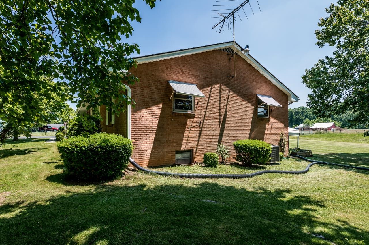 3252 Lyndhurst Road Stuarts Draft, VA 24477 - Photo 39 of 75 a front view of a house with a yard
