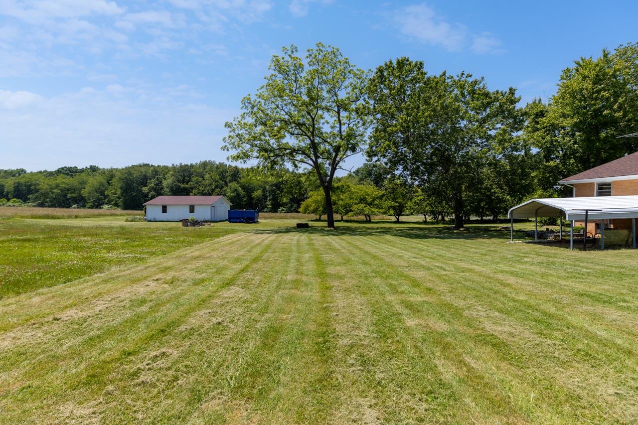 3252 Lyndhurst Road Stuarts Draft, VA 24477 - Photo 45 of 75 a view of yard with swimming pool and trees