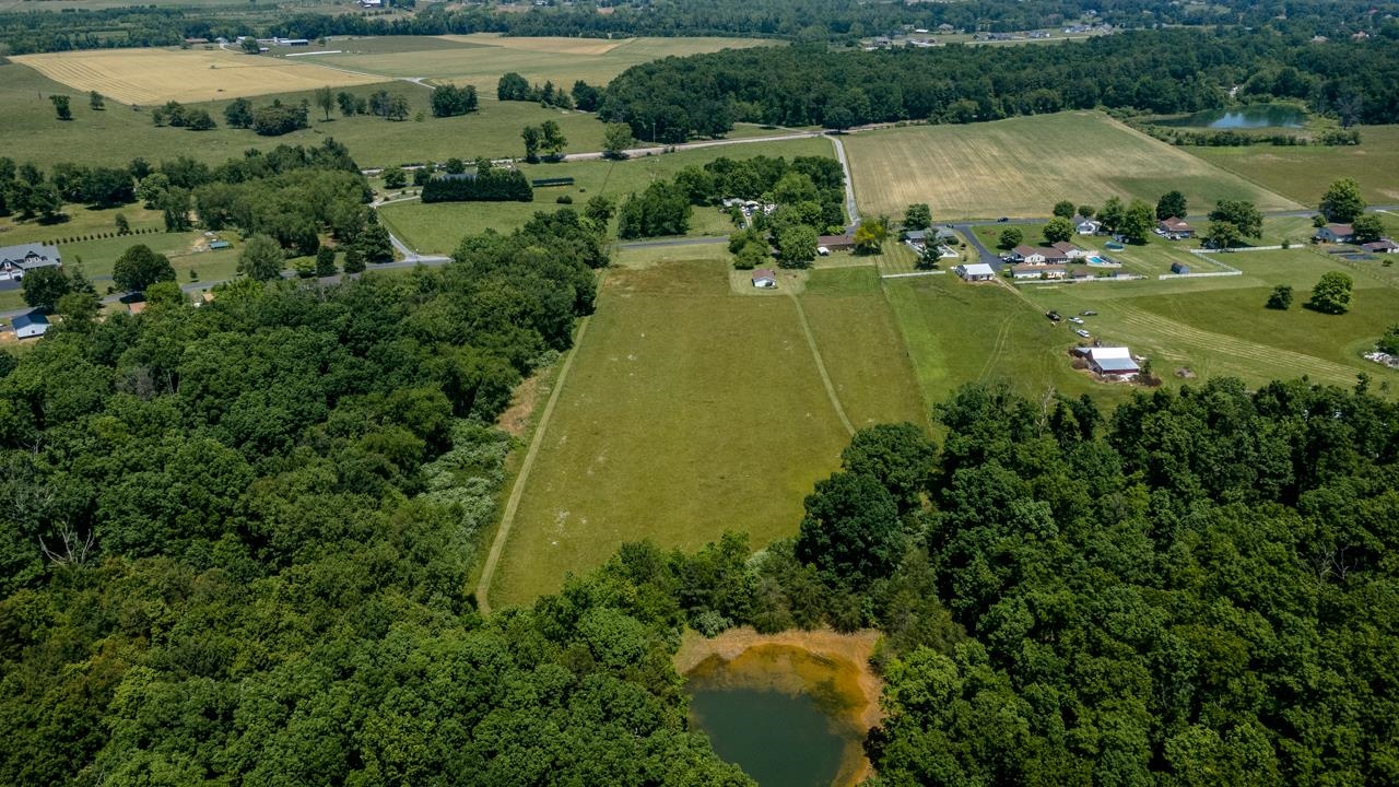 3252 Lyndhurst Road Stuarts Draft, VA 24477 - Photo 50 of 75 an aerial view of residential houses with outdoor space and swimming pool
