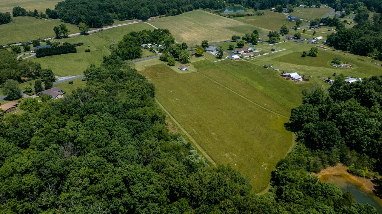 3252 Lyndhurst Road Stuarts Draft, VA 24477 - Photo 51 of 75 an aerial view of a residential houses with outdoor space and trees all around