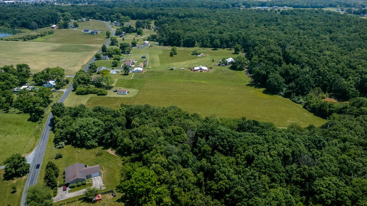 3252 Lyndhurst Road Stuarts Draft, VA 24477 - Photo 52 of 75 an aerial view of a houses with outdoor space and trees all around