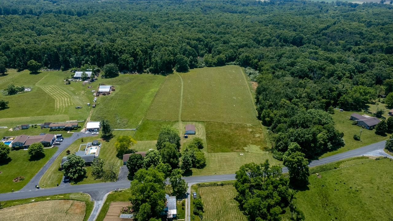 3252 Lyndhurst Road Stuarts Draft, VA 24477 - Photo 55 of 75 an aerial view of a residential houses with outdoor space and trees all around