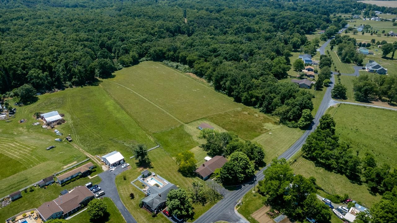 3252 Lyndhurst Road Stuarts Draft, VA 24477 - Photo 56 of 75 an aerial view of a residential houses with outdoor space and trees all around