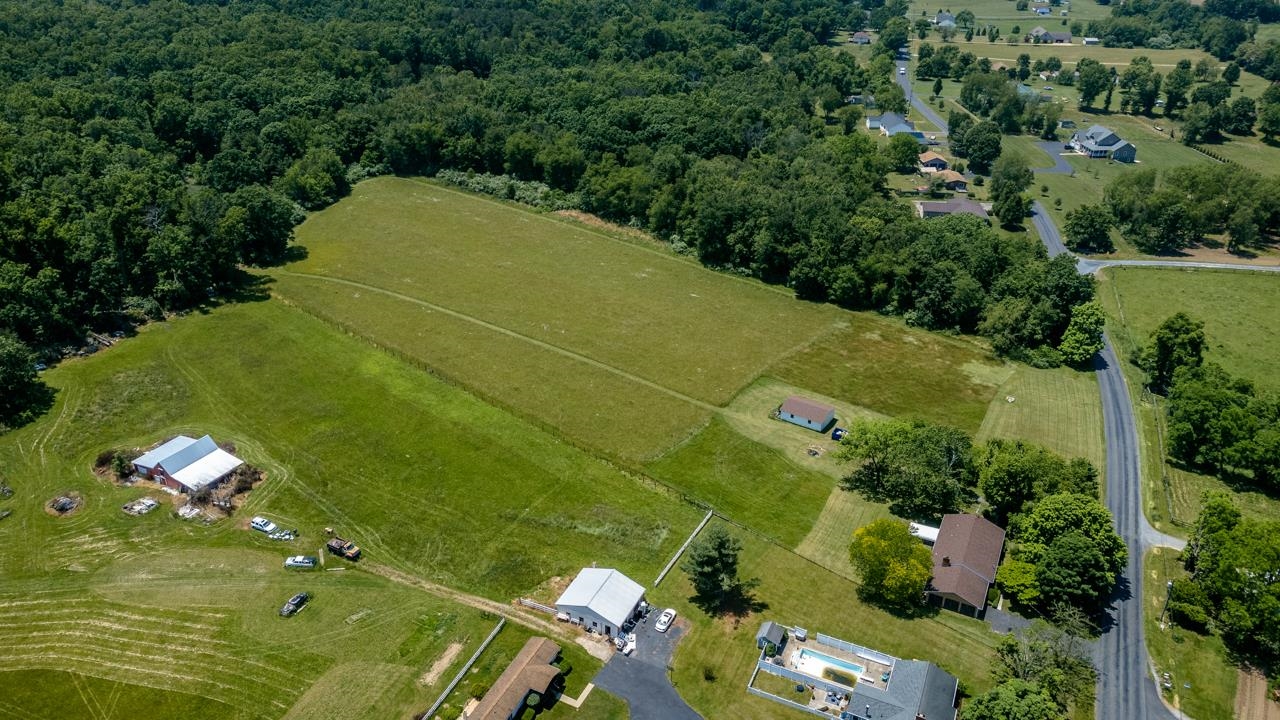 3252 Lyndhurst Road Stuarts Draft, VA 24477 - Photo 57 of 75 an aerial view of a residential houses with outdoor space and trees all around