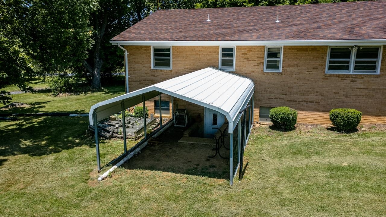 3252 Lyndhurst Road Stuarts Draft, VA 24477 - Photo 67 of 75 a view of house with backyard space and sitting area