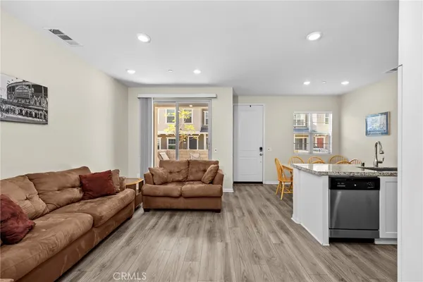 a kitchen with a stove and a refrigerator