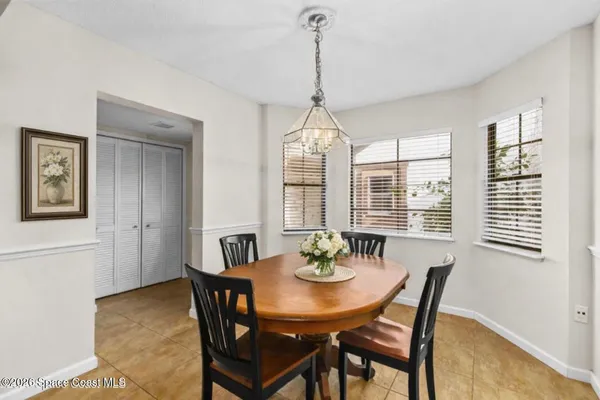 a view of a dining room with furniture