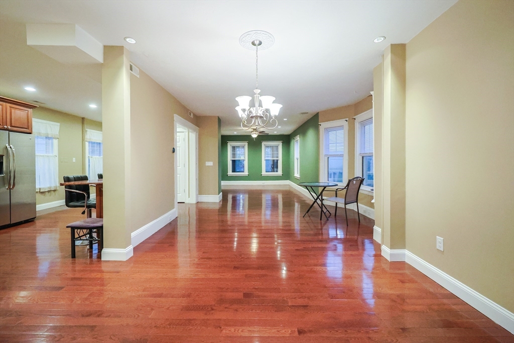 11 Hockanum Way Worcester, MA 01606 - Photo 11 of 36 a view of a dining room with furniture window and wooden floor